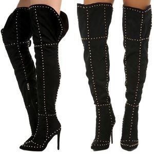 Thigh high pointed to black studdded boot
